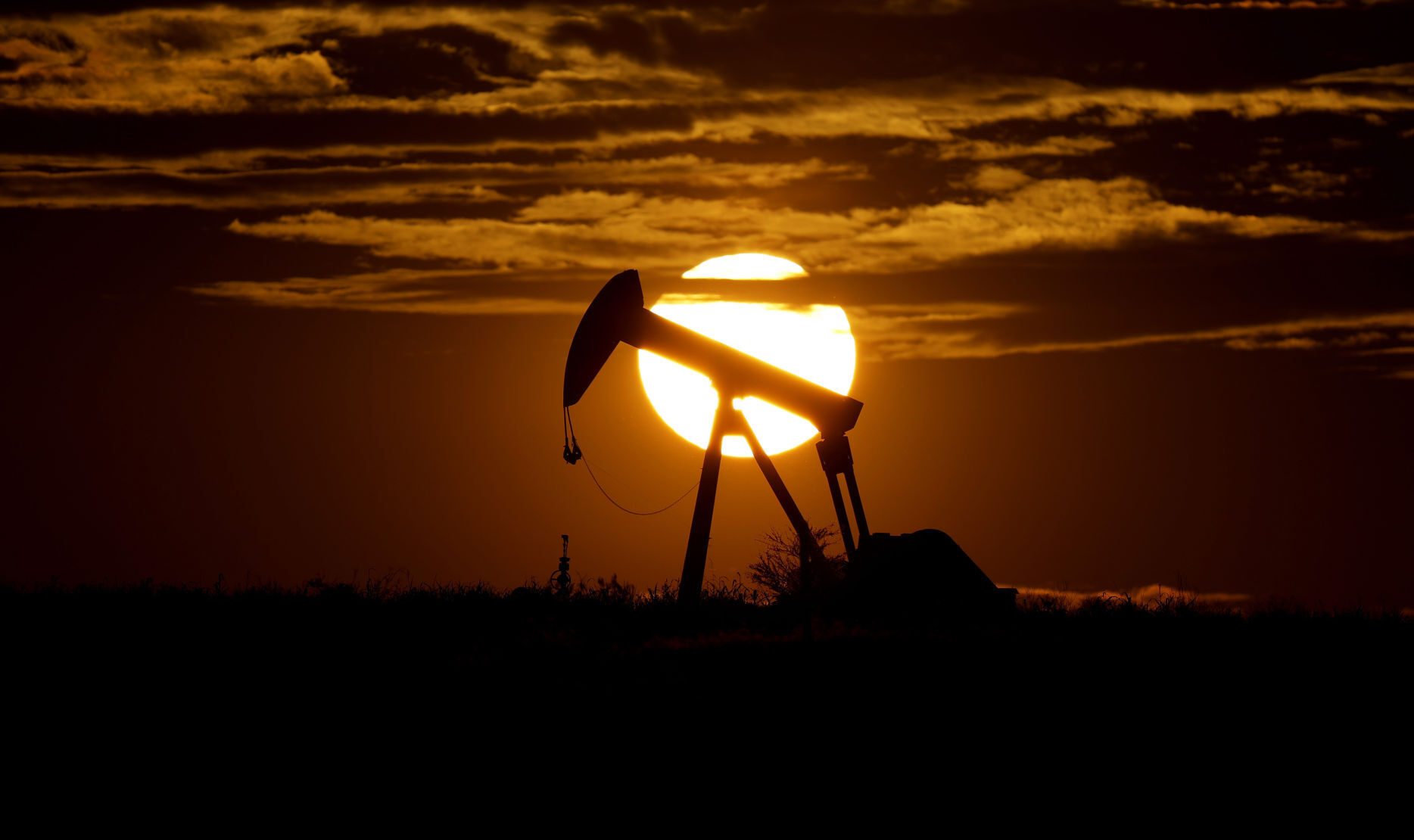APTOPIX Virus Outbreak Oil Texas Daily Life